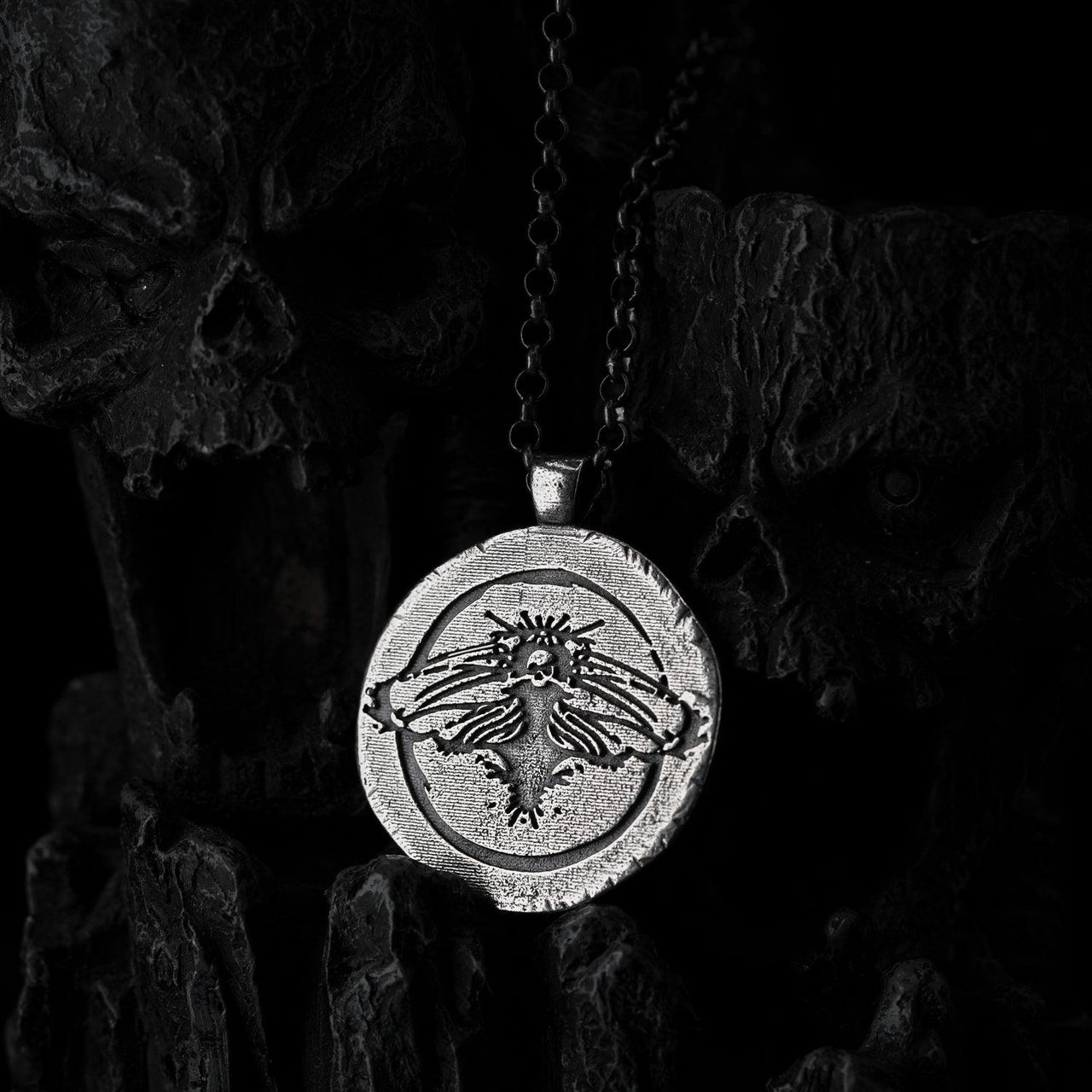 Death's-Head Hawkmoth on a circular pendant by Black Feather Design