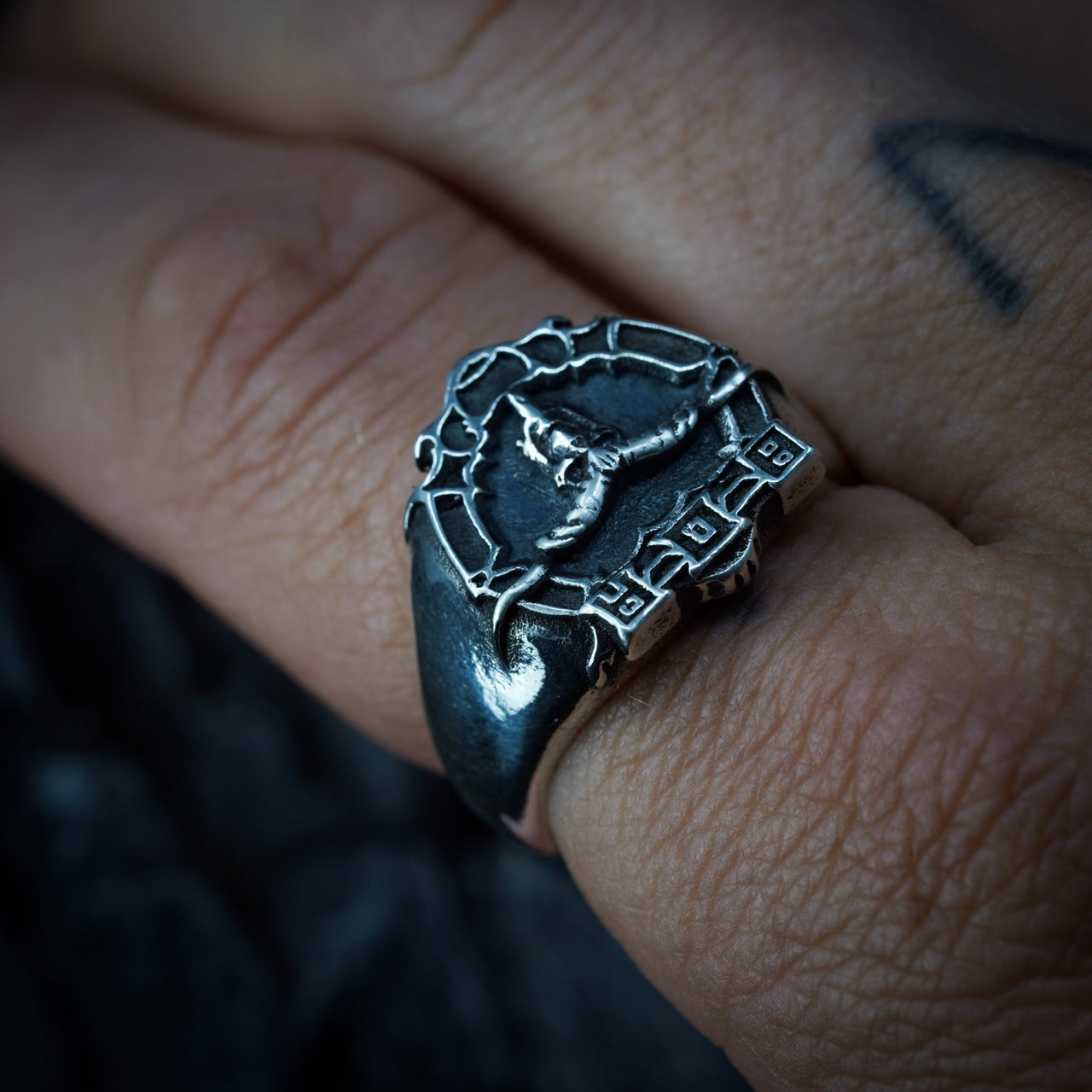 Bloodstock Signet Ring on hand - 925 Silver - Black Feather Design