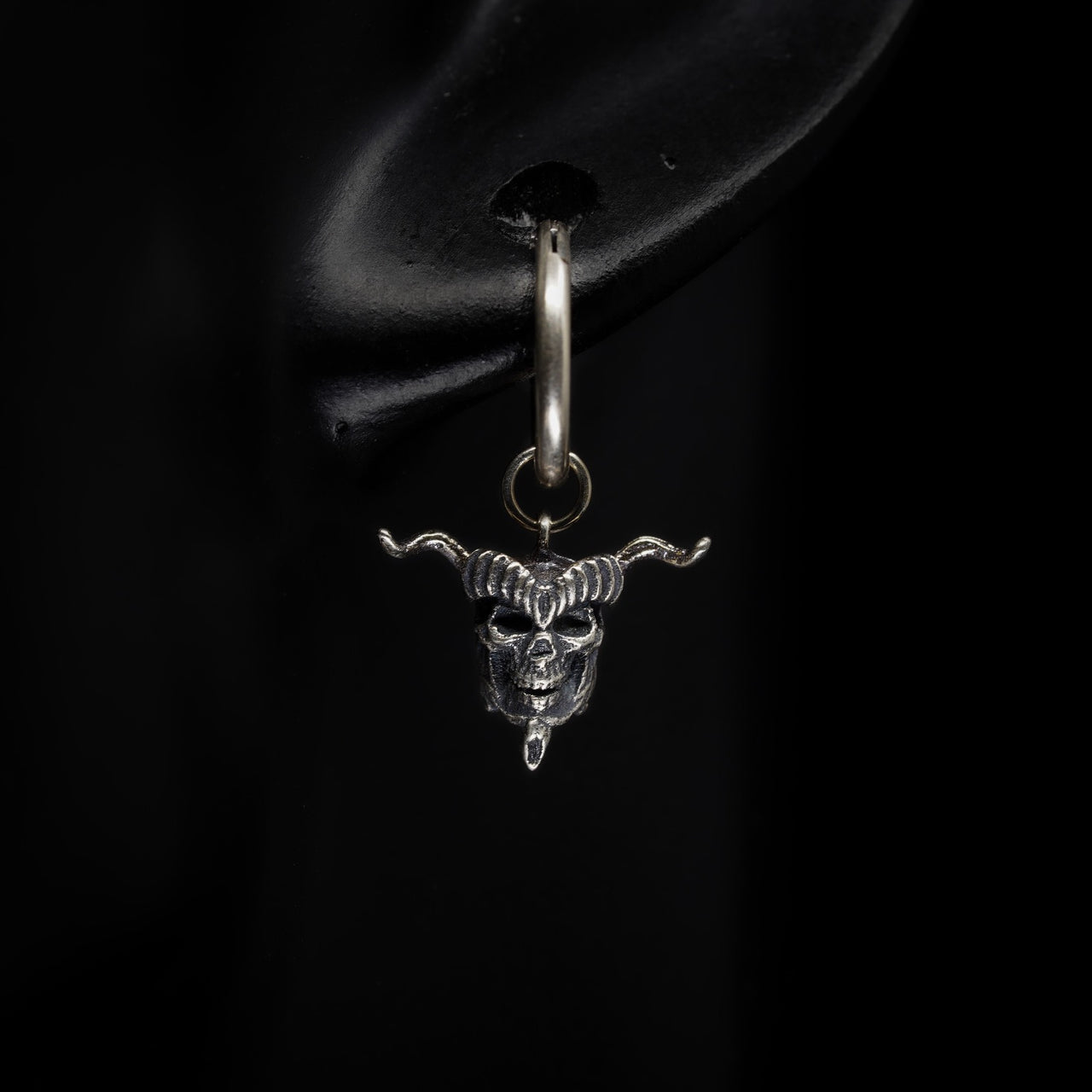 S’Tan Skull Drop Earring on model - Bloodstock - Black Feather Design