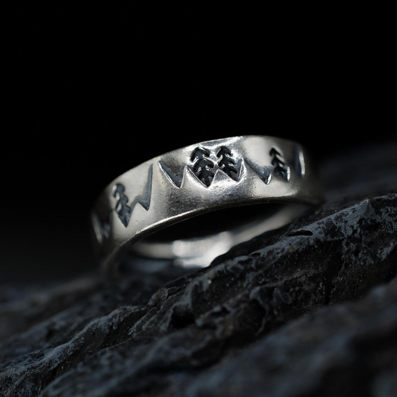 Close up of large mountain ring - 925 Sterling Silver - Black Feather Design