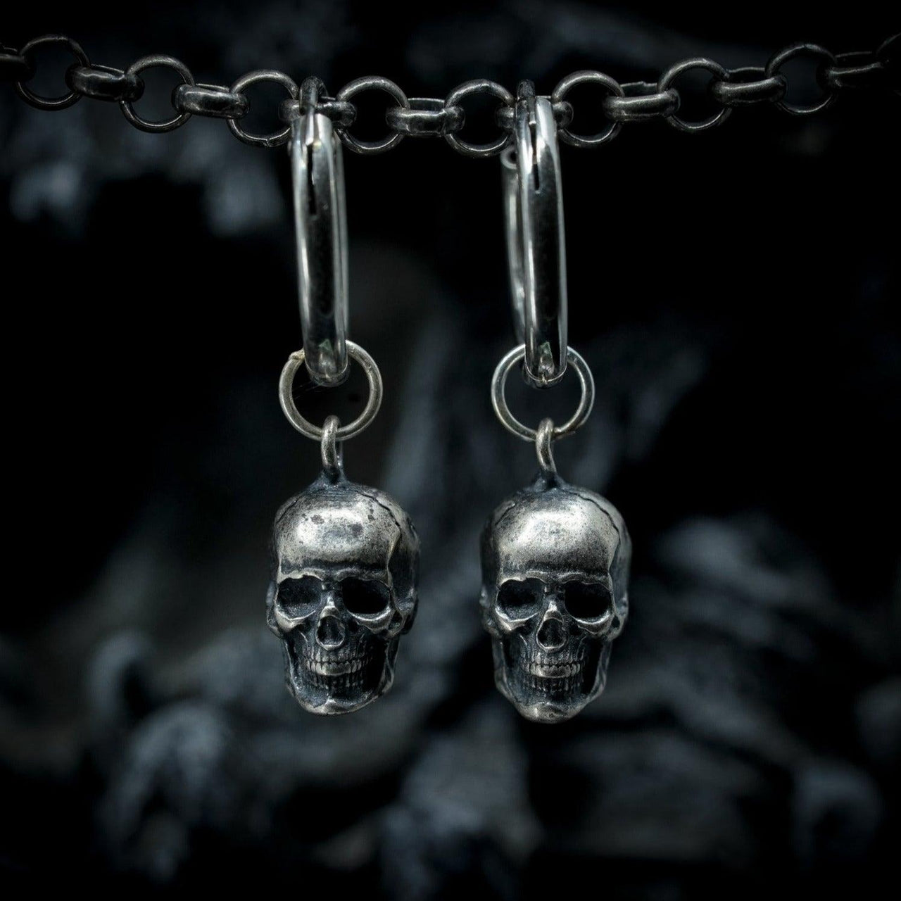 Sterling Silver Skull Drop earrings by Black Feather Design